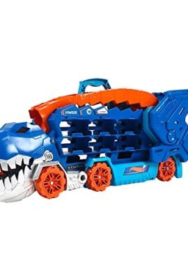 ​Hot Wheels City - Mega Dino Trasportatore, pista da corsa che si trasforma in un T-Rex, playset con luci e suoni, box per riporre 20 macchinine in scala 1:64, giocattolo per bambini, 4+ anni, HNG50