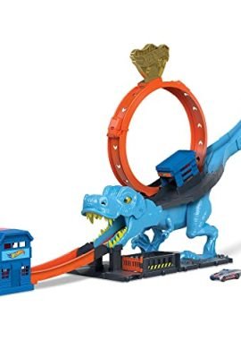 Hot Wheels - Hot Wheels City Pista con 1 macchinina, sfreccia attraverso un loop gigante per sconfiggere il mega dinosauro, acrobatica da corsa con T-Rex, giocattolo per bambini 4+ Anni, HNP77